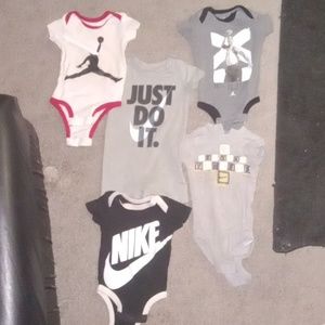 Baby boys nike and jordan one pice shirts